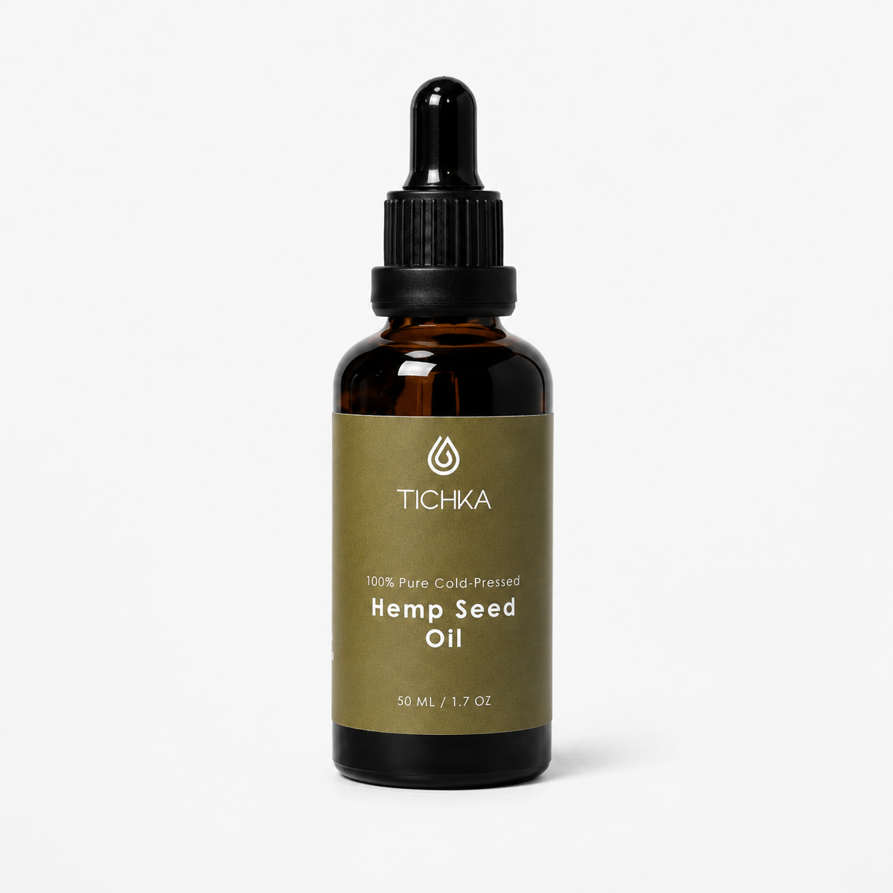 A 50 mL amber glass dropper bottle of Tichka Hemp Seed Oil with a black dropper cap and an olive green label, set against a clean white background.