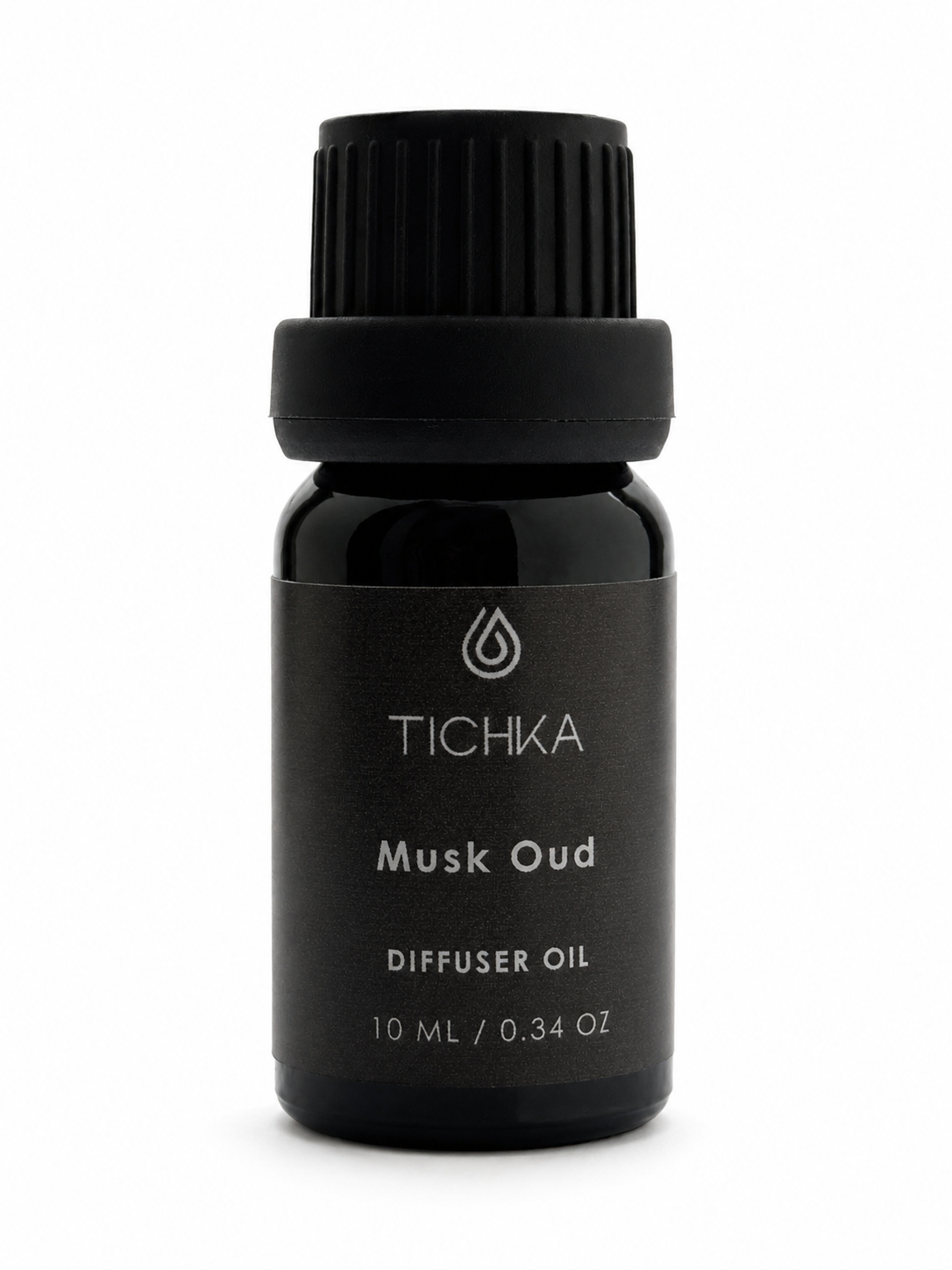 Black bottle of TICHKA Musk Oud diffuser oil on a white background