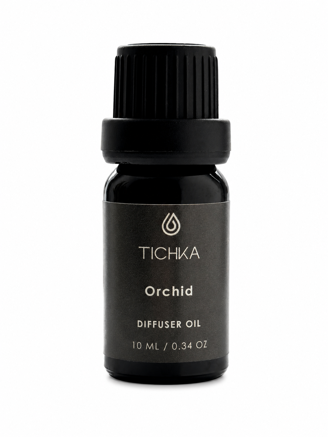 Black bottle of TICHKA Orchid diffuser oil on a white background